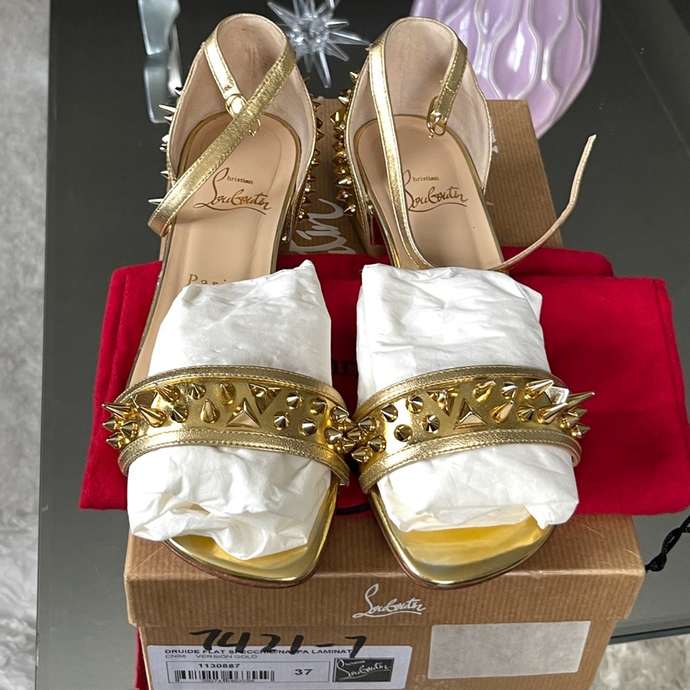 Christian Louboutin
Druide Spiked Patent Flat Sandal